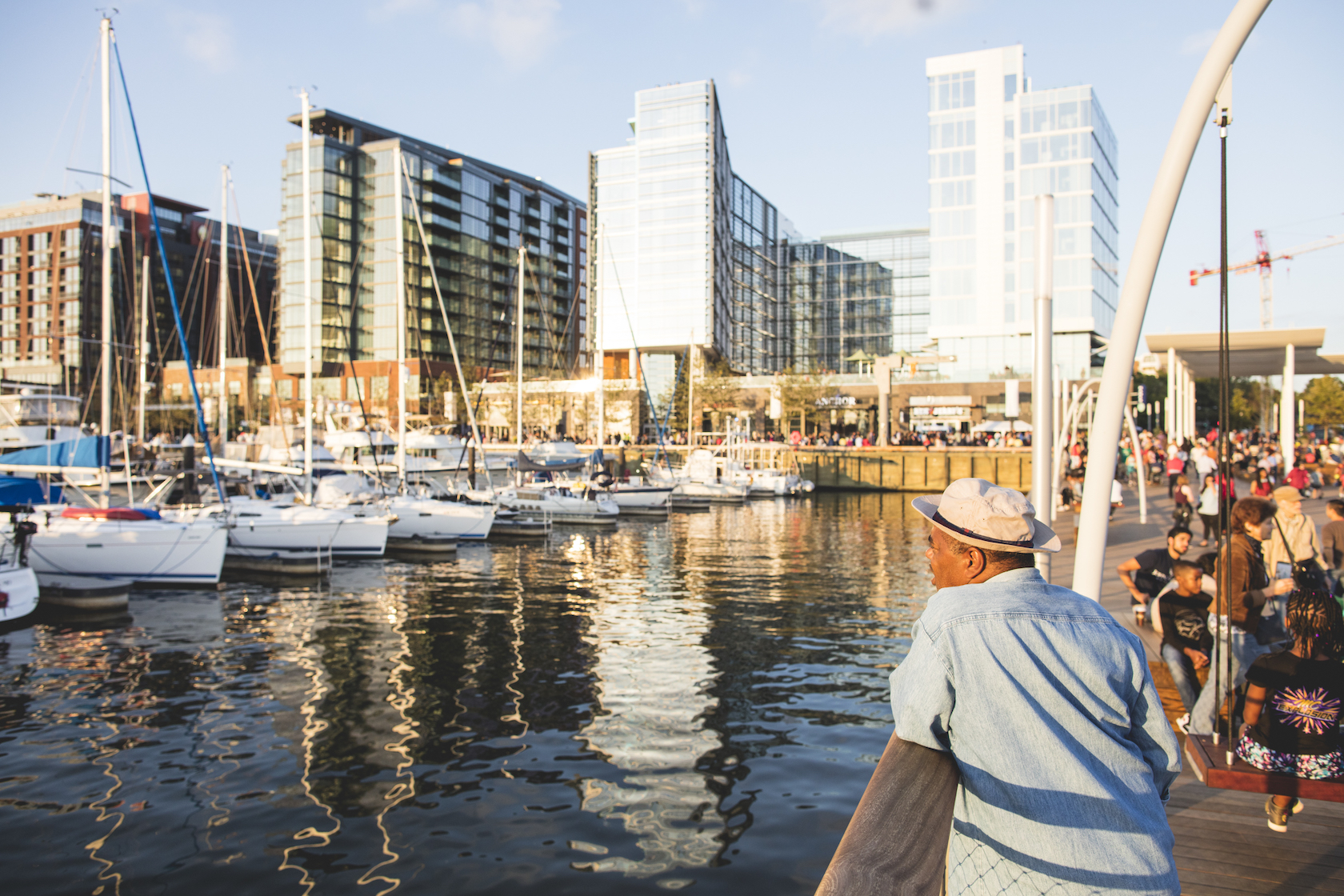 Man standing on the pier overlooking the Wharf