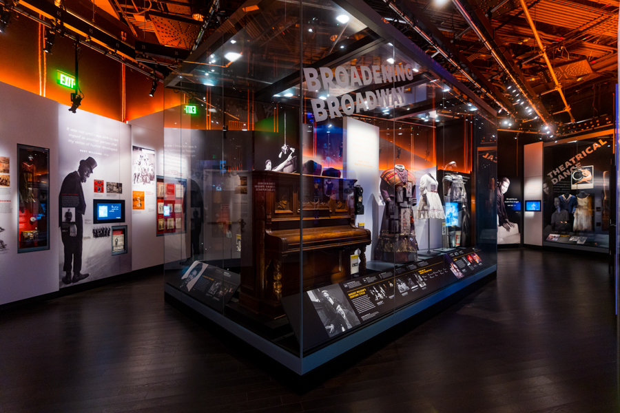 People at an ec=xhiibit in the Smithsonian National Museum of African American History and Culture