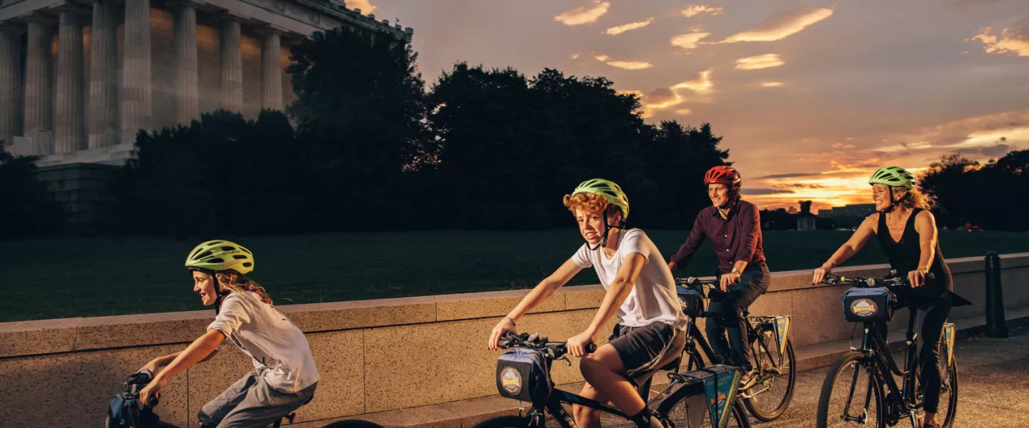 Family on DC bike tour at Lincoln Memorial