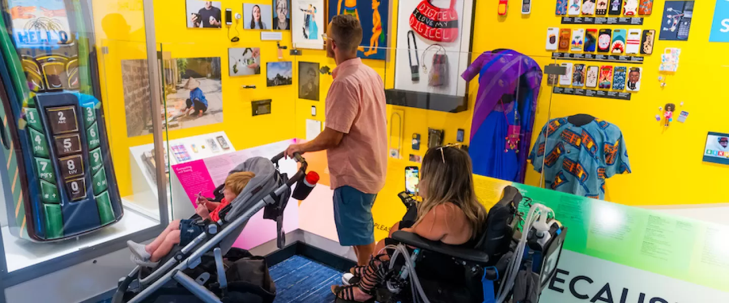 Family with baby stroller and wheelchair