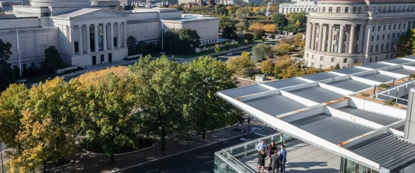 Meeting taking place on the Newseum terrace overlooking Washington, DC's museums and more