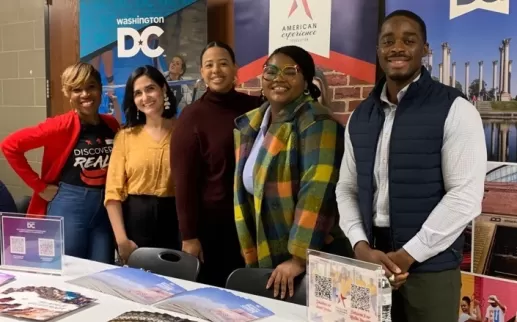 a group of people at a career fair

