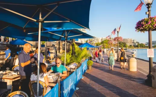 Diners outside at Fiola Mare seafood restaurant in Georgetown - Restaurant on the waterfront in Washington, DC
