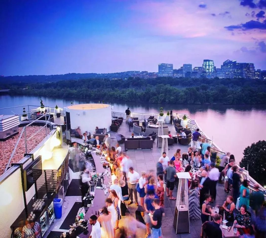 @watergatehotel - Top of the Gate rooftop bar at The Watergate Hotel - Sunset overlooking Potomac River in Washington, DC