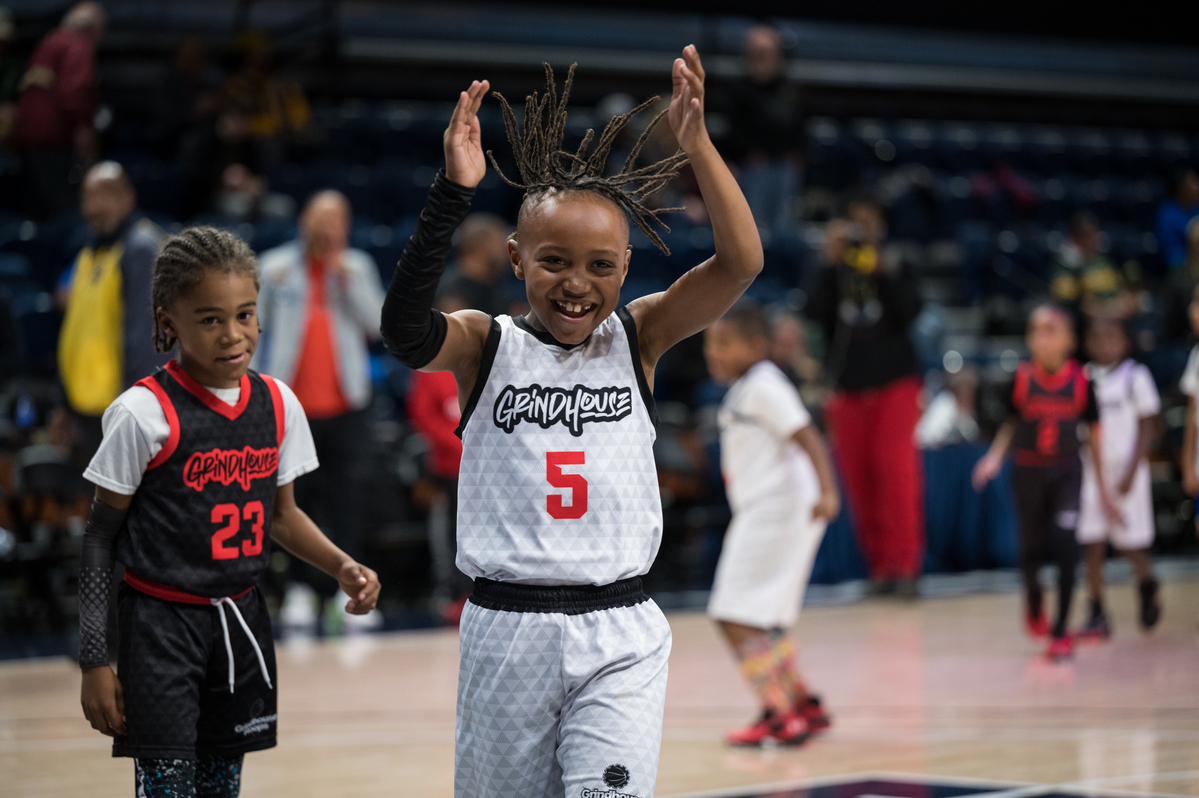 Kid playing basketball