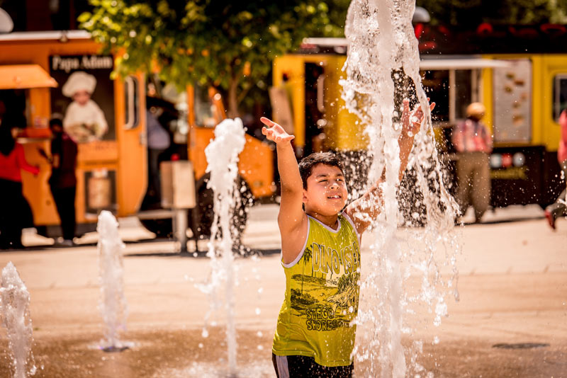 Child playing in water park on the Capitol Riverfront - Things to do on the water in Washington, DC